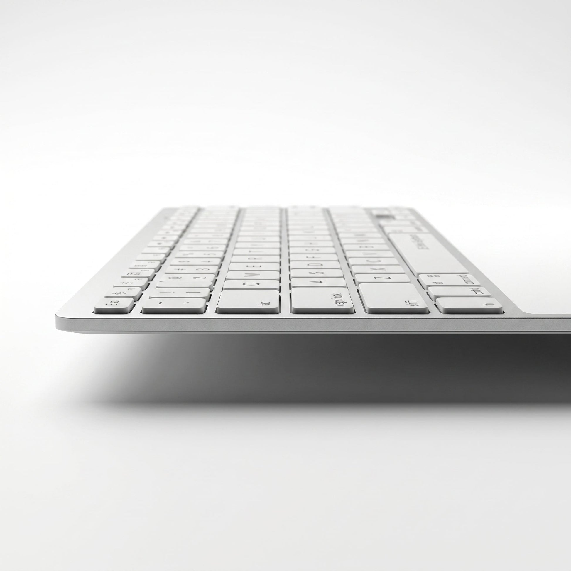 bluetooth keyboard connected to desktop computer wireless workspace setup